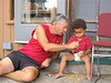 Baker River School Community > Peter helps Javi pick up his crackers